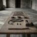 The dismantled parts of a concealed mechanism laid out on a bare oak trestle table in an empty stone hall: lengths of corroded iron wire, three small wooden pulleys, a waxed cord, two brass pins and a split oak block with an empty socket. A pale worn ring in the flagstone floor shows where people once stood.